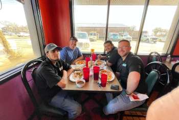 Garage Door Team Enjoying a Meal Together