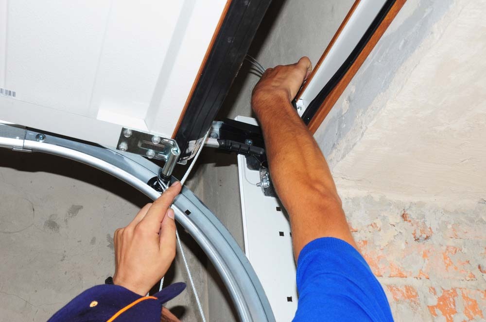 broken garage door spring