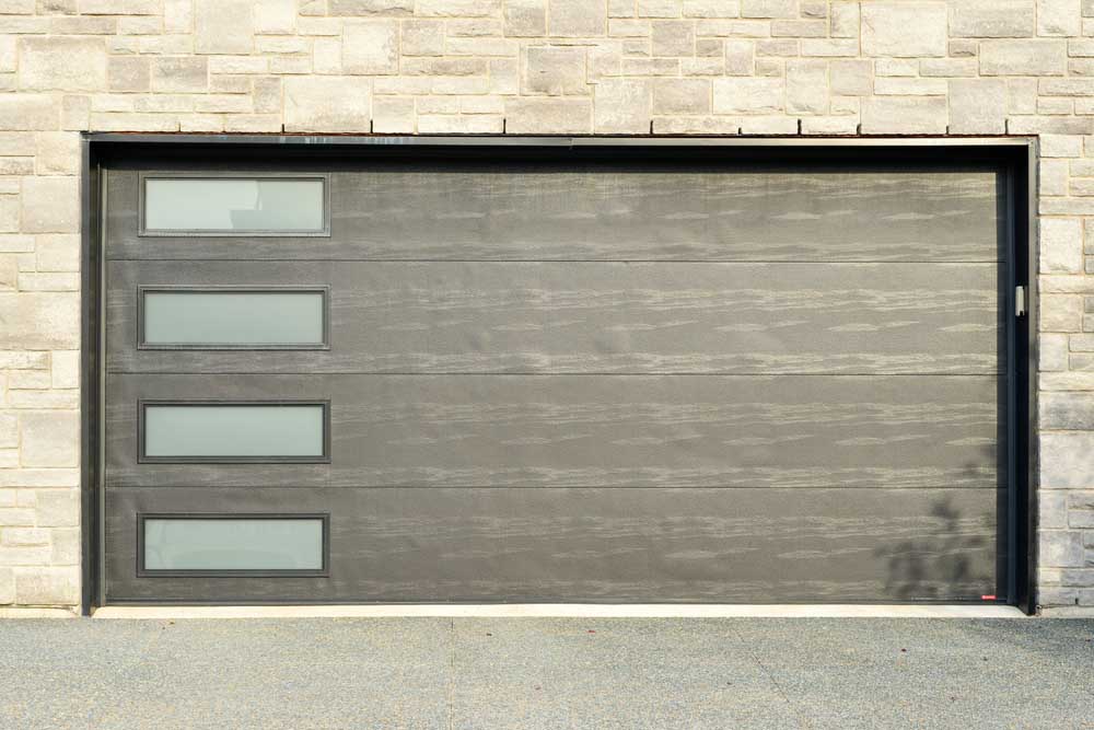 What To Do When You Damage Your Garage Door With Your Car Or Truck?