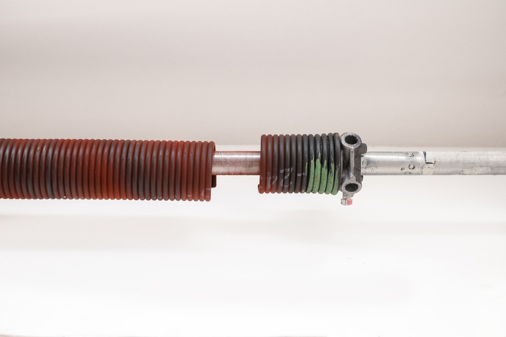 How To Take Care Not To Damage Your Garage Door Spring?